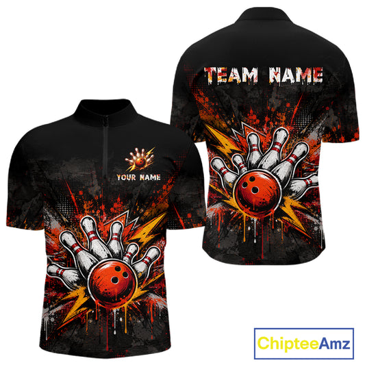 Black short-sleeve zip-front shirt shown from front and back, featuring a bowling-themed graphic with a red bowling ball, white bowling pins, and orange/yellow paint splatter. Front has placeholder text 'YOUR NAME' and 'TEAM NAME' on the chest.