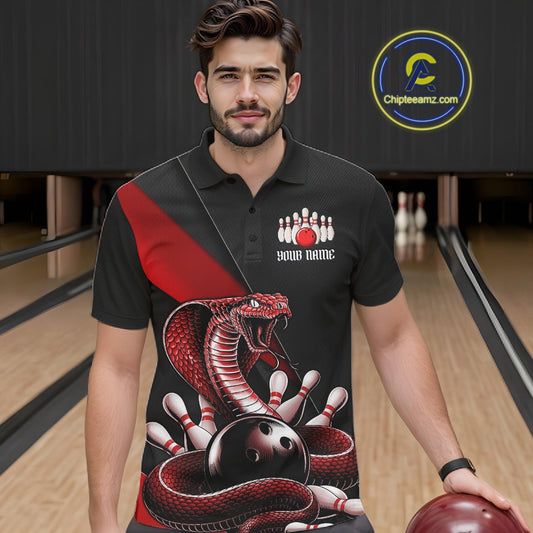 Male model at the bowling lane wearing a black bowling polo with red cobra graphics and bowling pin details.