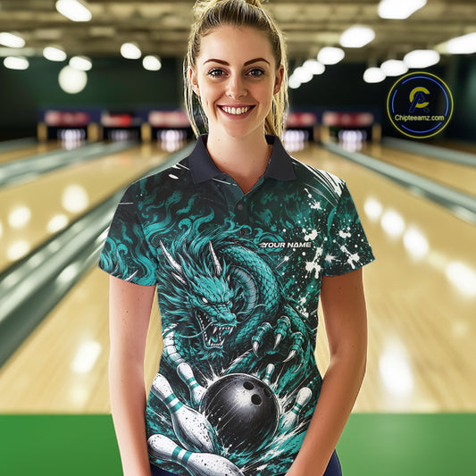 Woman wearing a bowling shirt with a dragon design in a bowling alley.