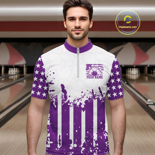 Male bowler posing on a lane wearing a personalized purple US flag performance bowling quarter-zip team shirt.