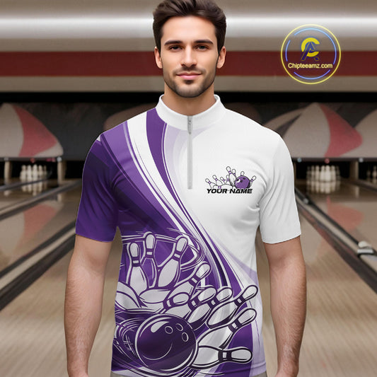Male model in a bowling lane wearing a white and purple quarter zip shirt with a curved bowling strike graphic and pins being knocked down.