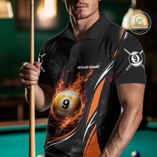 A man wearing a black custom polo shirt with a fiery billiard 9-ball graphic and holding a pool cue in a pool hall setting.