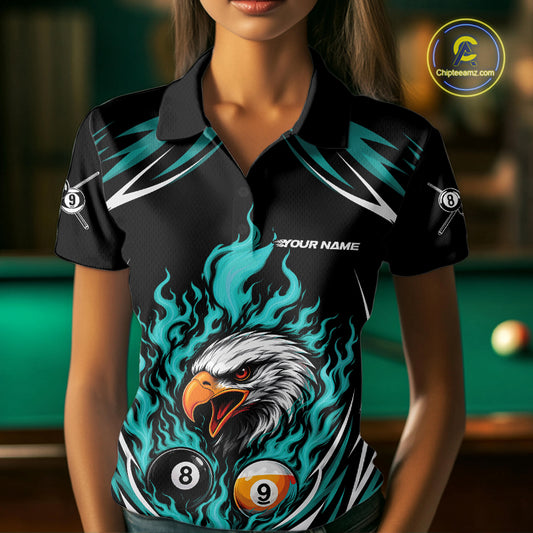 A woman wearing a black and rwal custom polo shirt featuring a flaming eagle surrounded by billiard 8 and 9 balls.