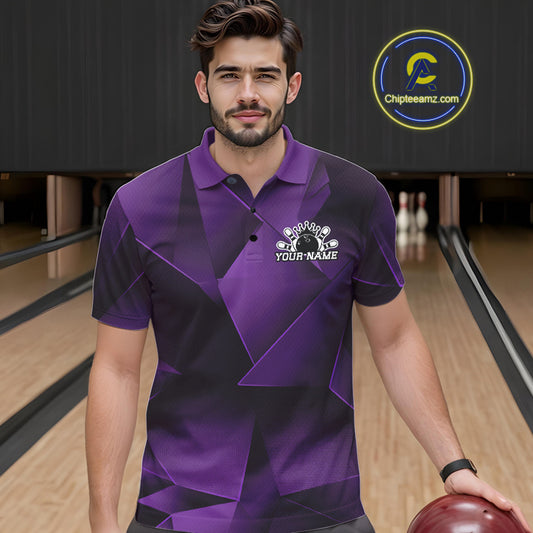 Man wearing a purple and black bowling shirt with a logo on a bowling alley.
