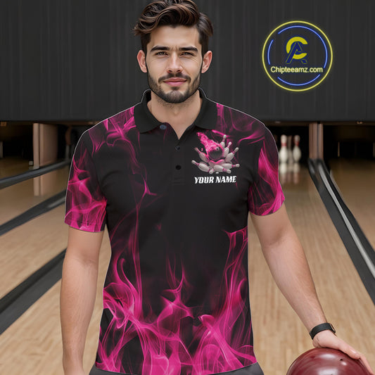 Male model wearing a black and pink bowling polo shirt at a bowling lane with dynamic bowling strike artwork and fiery accents.