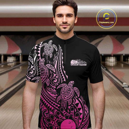 Male model wearing a black and pink bowling quarter-zip shirt at the lane with turtle-inspired bowling artwork and tribal details.