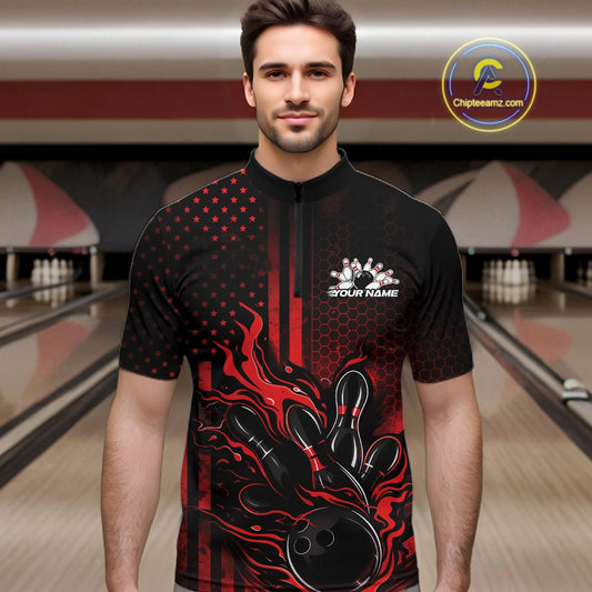 Male model wearing a black and red bowling quarter-zip shirt at a bowling lane with fiery bowling action artwork and patriotic graphics.
