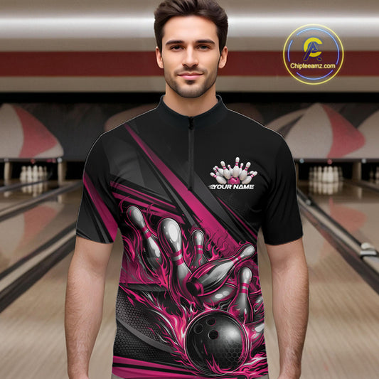Male model in a bowling lane wearing a black quarter-zip shirt, hot pink flame bowling ball hitting pins with dynamic abstract stripe graphics.
