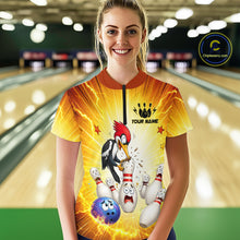 Load image into Gallery viewer, Person wearing a yellow bowling shirt with a cartoon design in a bowling alley.