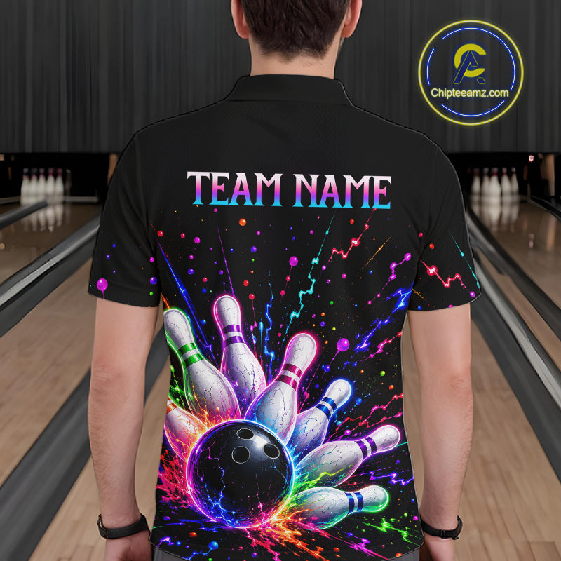Person wearing a black bowling shirt with colorful design and 'TEAM NAME' text in a bowling alley.
