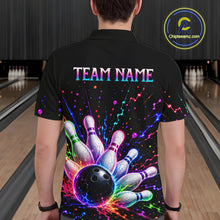Load image into Gallery viewer, Person wearing a black bowling shirt with colorful design and 'TEAM NAME' text in a bowling alley.