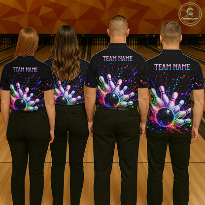 Four people wearing black shirts with colorful bowling designs and 'TEAM NAME' text on a bowling alley background.