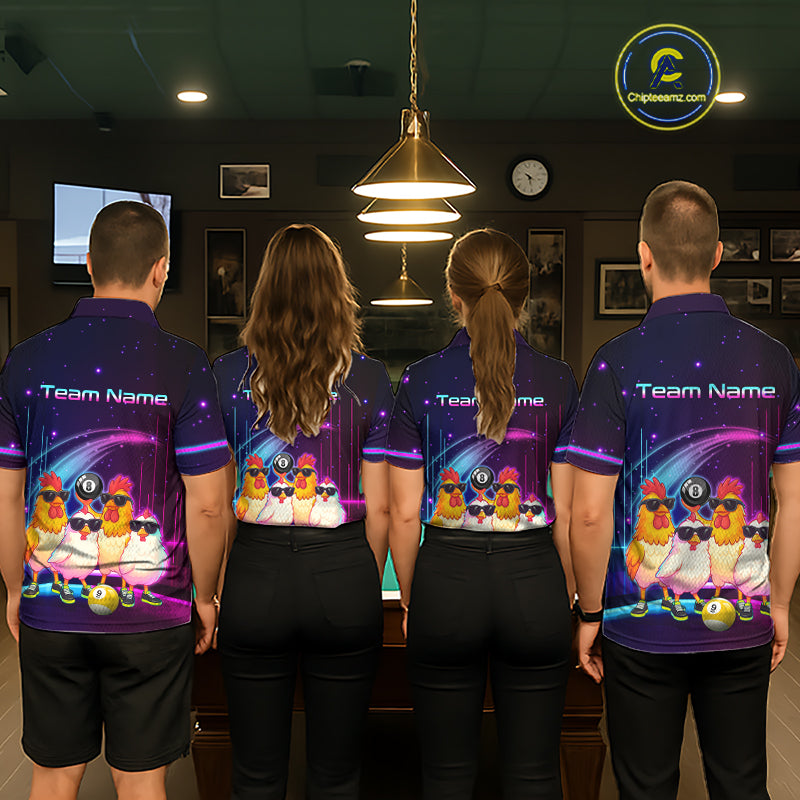 Four people standing with their backs to the camera wearing matching custom bowling-themed team shirts in a dimly lit bowling alley. The shirts feature a colorful bowling pin and bowling ball graphic on a purple and blue starry background, with 'Team Name' printed on the back.