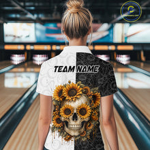 Load image into Gallery viewer, Person wearing a shirt with a skull and sunflower design in a bowling alley.