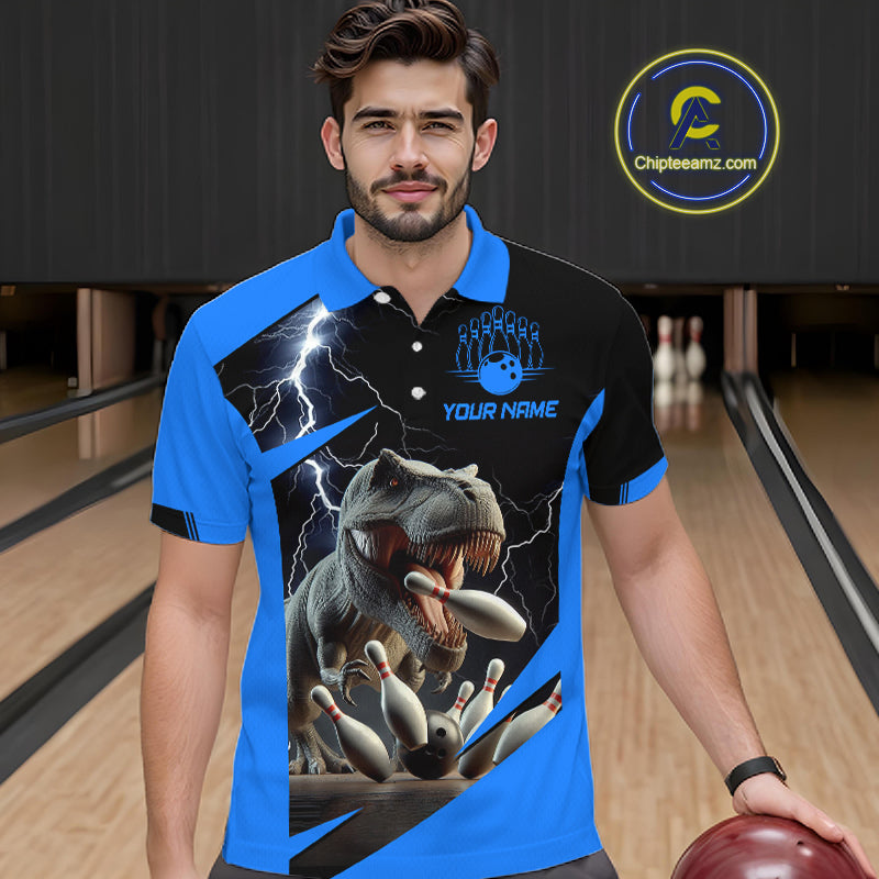 A man wearing a custom bowling-themed polo shirt with a blue and black color-blocked design, featuring a graphic of a T-Rex bowling through pins with lightning accents. The shirt has 'YOUR NAME' printed on the chest.