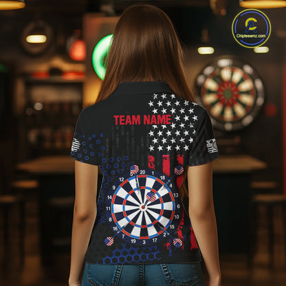 Back view of a female model wearing a custom black darts polo shirt featuring an American flag design, a large dartboard graphic, and 'TEAM NAME' printed in red