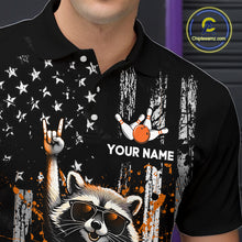 Load image into Gallery viewer, Black polo shirt with a raccoon graphic and customizable text on a dark background