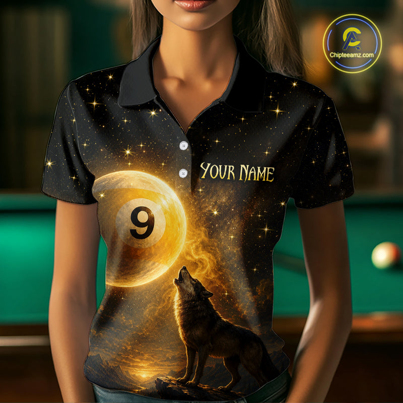 A woman wearing a black short-sleeve polo shirt with a custom cosmic billiards design. The shirt features a large golden pool ball with the number 9, a howling wolf, and the text 'YOUR NAME' and 'CHOOSE NAME'.