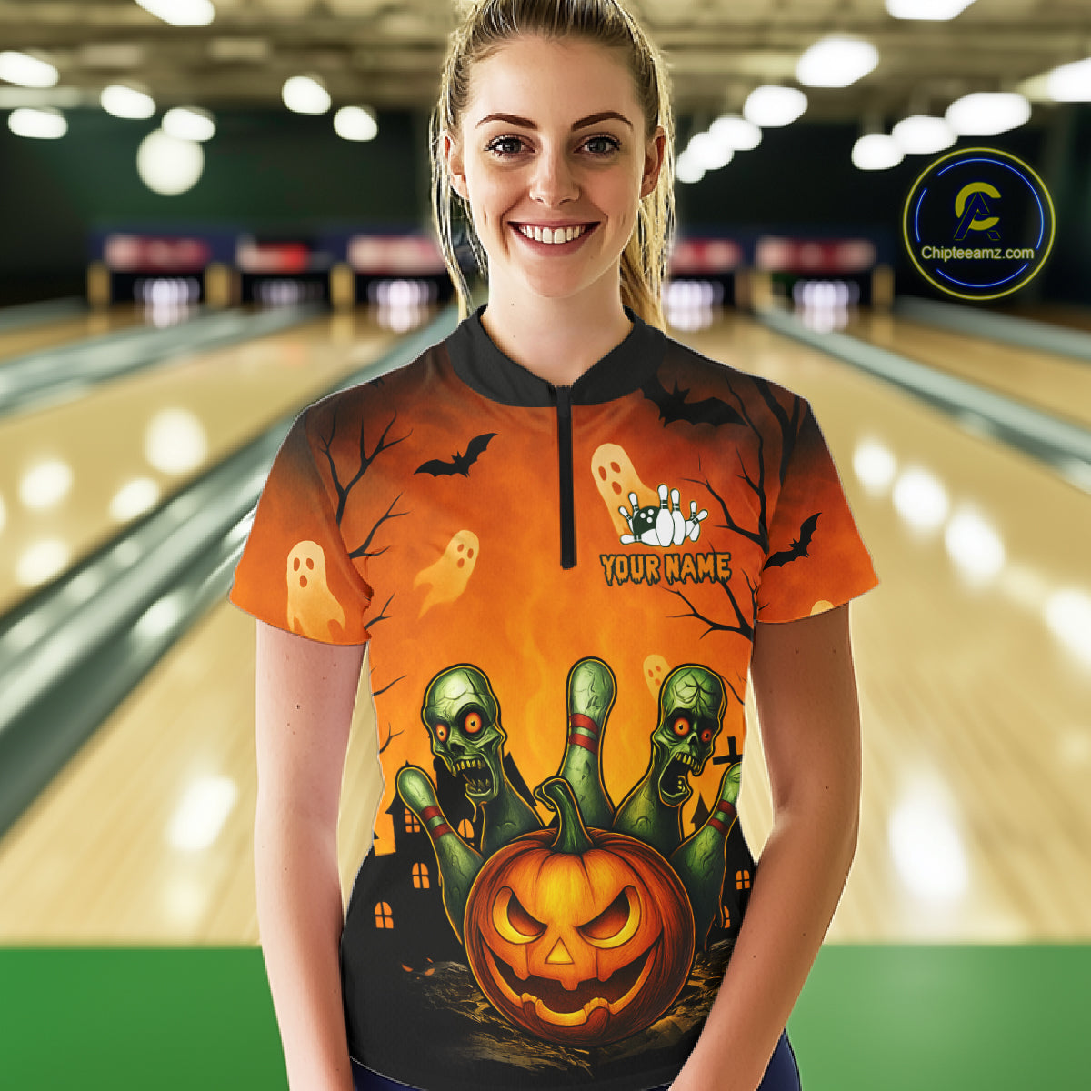 Person wearing a Halloween-themed bowling shirt in a bowling alley.