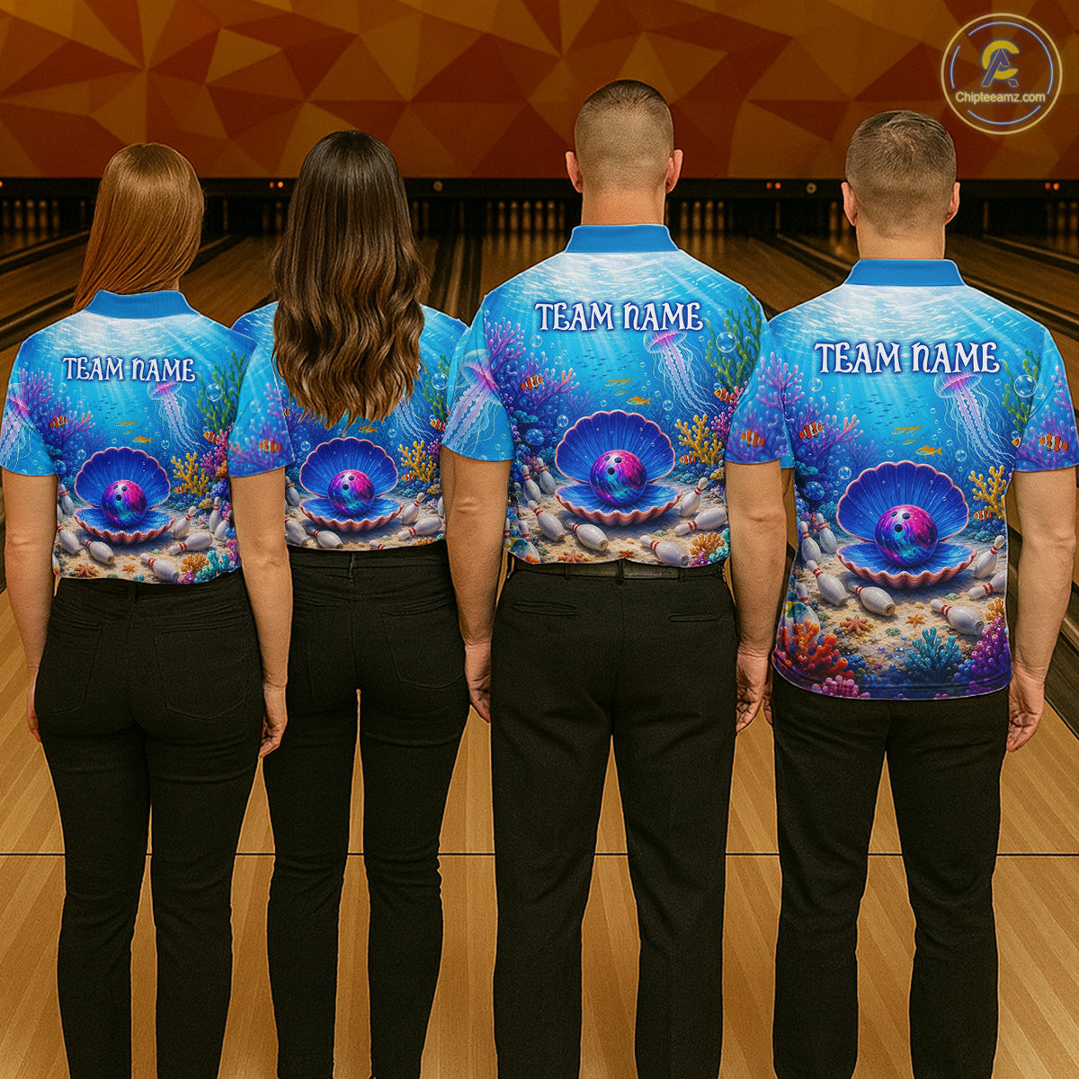 Four people wearing matching blue bowling shirts with ocean-themed designs and 'Team Name' text on a bowling alley.
