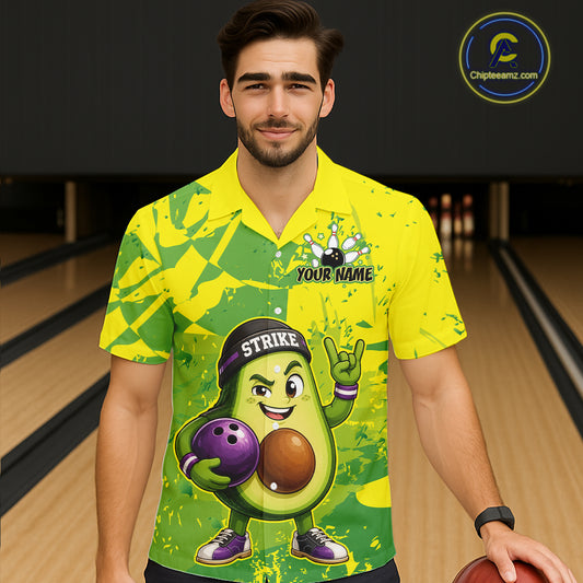 Person wearing a colorful bowling shirt with a cartoon character on a bowling alley.