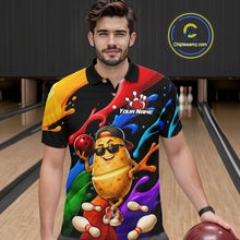 Load image into Gallery viewer, Man wearing a colorful shirt with a potato design holding a bowling ball in a bowling alley.