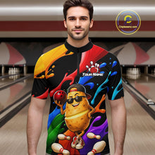 Load image into Gallery viewer, Man wearing a colorful bowling-themed shirt with a potato character in a bowling alley.