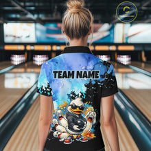 Load image into Gallery viewer, Person wearing a colorful shirt with cartoon characters and 'TEAM NAME' text in a bowling alley.