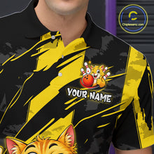 Load image into Gallery viewer, Close-up front view of a custom black yellow cat bowling polo shirt showing the personalized player name, playful cartoon cat graphic and yellow black paint stroke design