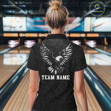Load image into Gallery viewer, Male model wearing a custom black patriotic bowling polo shirt back view displaying the personalized team name below a spread-wing bald eagle graphic at the bowling alley
