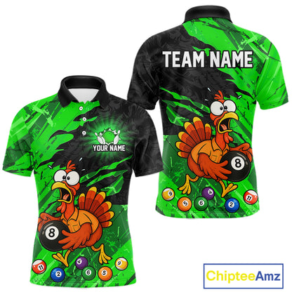Front and back views of a short-sleeve polo shirt with a green and black splatter background, featuring a cartoon angry chicken holding an 8-ball pool bill, colorful pool balls, and customizable text areas reading 'TEAM NAME' and 'YOUR NAME'.