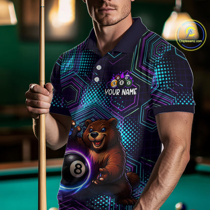 Person wearing a custom polo shirt with a bear and pool ball design, holding a pool cue.