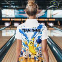 Load image into Gallery viewer, Person wearing a white shirt with cartoon characters and 'TEAM NAME' text in a bowling alley.