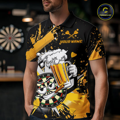 A man wearing a black and yellow short-sleeve polo shirt with a cartoon beer mug, dartboard, and splatter graphic. The shirt has 'YOUR NAME' printed on the chest, and a 'Chipstreamz' logo is visible in the top right corner.