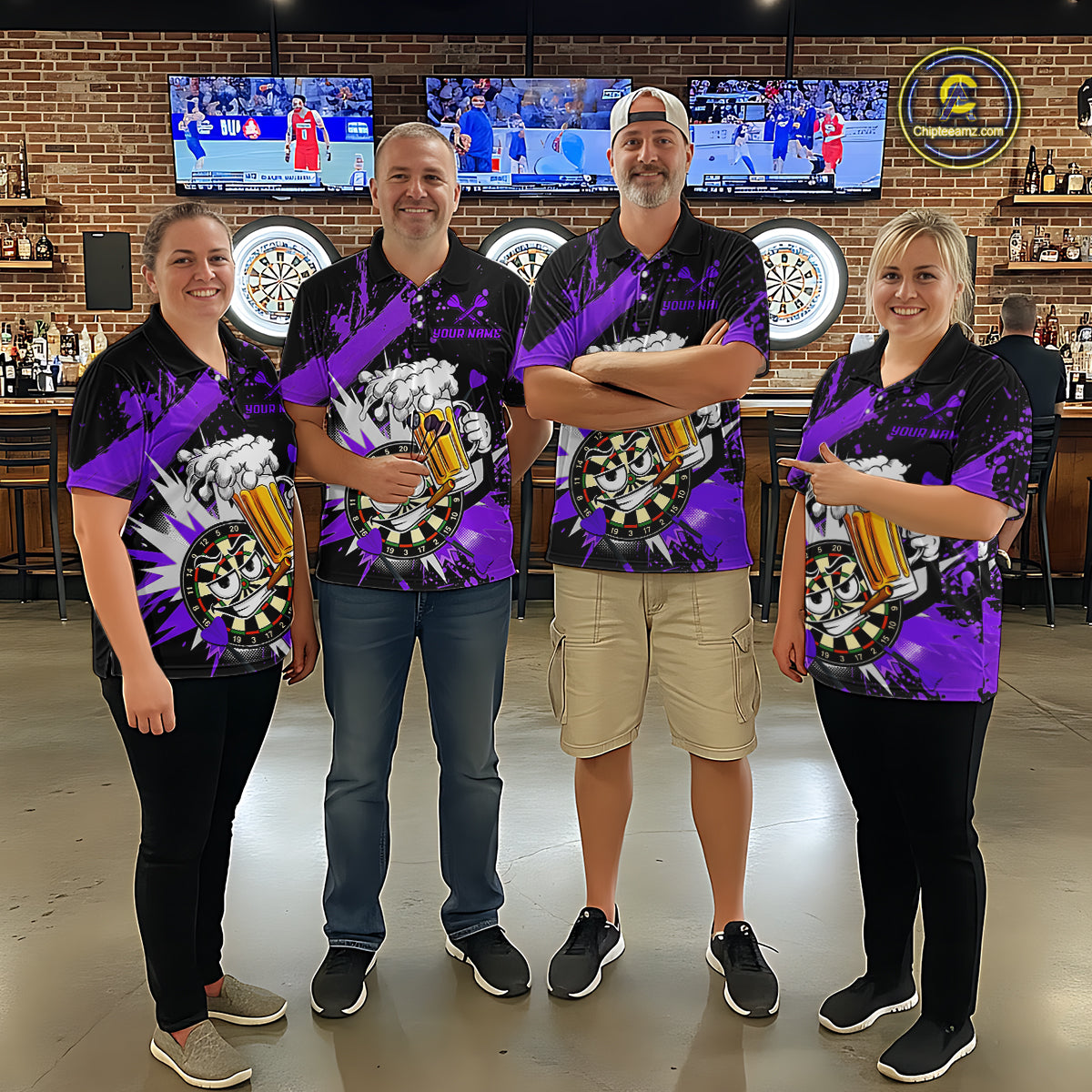 Four people standing together in a bar wearing matching purple and black graphic shirts with a large beer mug design on the front.