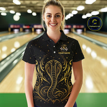 Load image into Gallery viewer, Woman wearing custom black &amp; gold cobra bowling polo shirt, front view mockup, personalized bowling league jersey.
