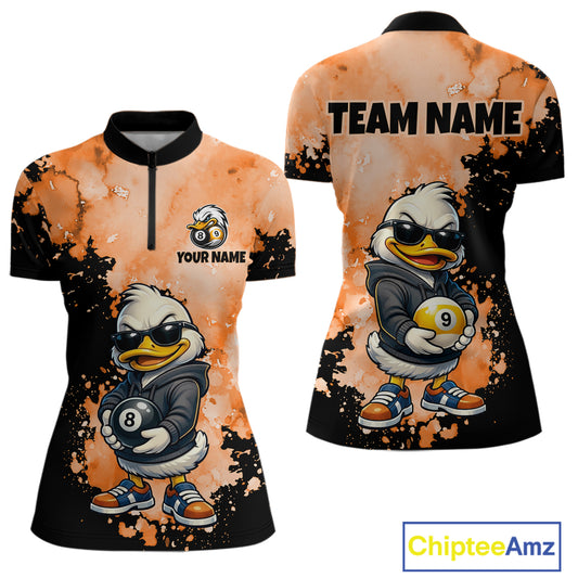 Front and back views of a women's short-sleeve polo shirt with a black collar and a split zipper. The shirt features a custom graphic print of a cartoon duck wearing sunglasses and a hoodie, holding pool balls, over an orange and black splattered background.