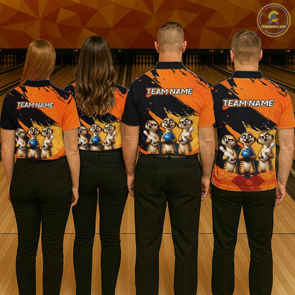 Four people standing at the back of a bowling alley wearing matching bowling shirts with a custom meerkat graphic and placeholder text 'TEAM NAME'.