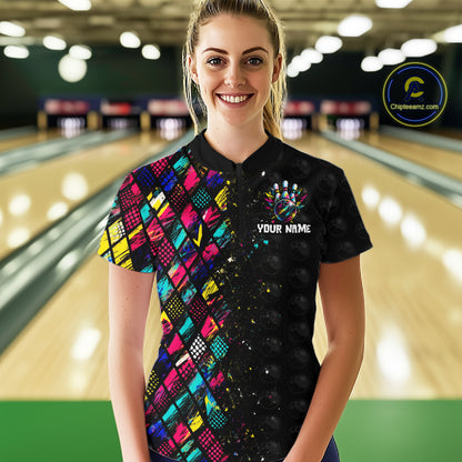 Woman wearing a colorful bowling shirt with a personalized design in a bowling alley.