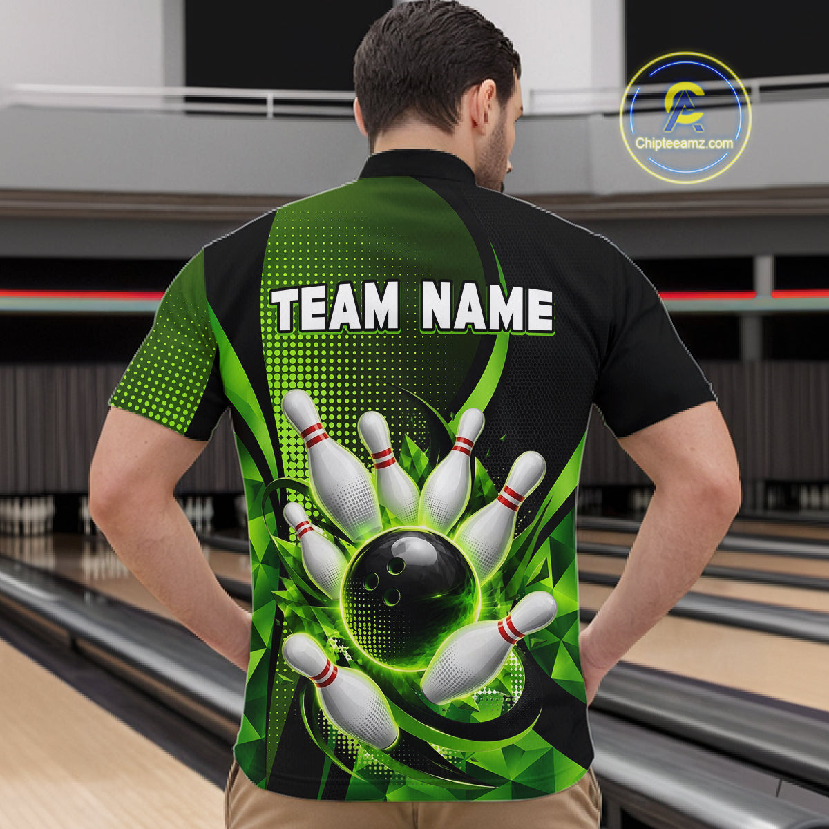 Person wearing a bowling-themed shirt with a graphic design in a bowling alley.