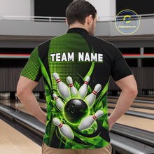 Load image into Gallery viewer, Person wearing a bowling-themed shirt with a graphic design in a bowling alley.