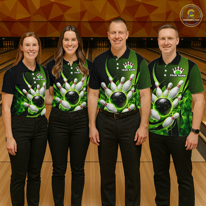 Four people wearing matching green bowling shirts in a bowling alley.