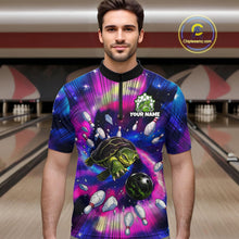 Load image into Gallery viewer, Man wearing a colorful bowling shirt with a turtle design in a bowling alley.