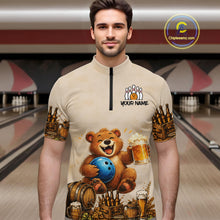 Load image into Gallery viewer, Man wearing a quarter-zip jersey with a bear holding a bowling ball and beer design in a bowling alley.