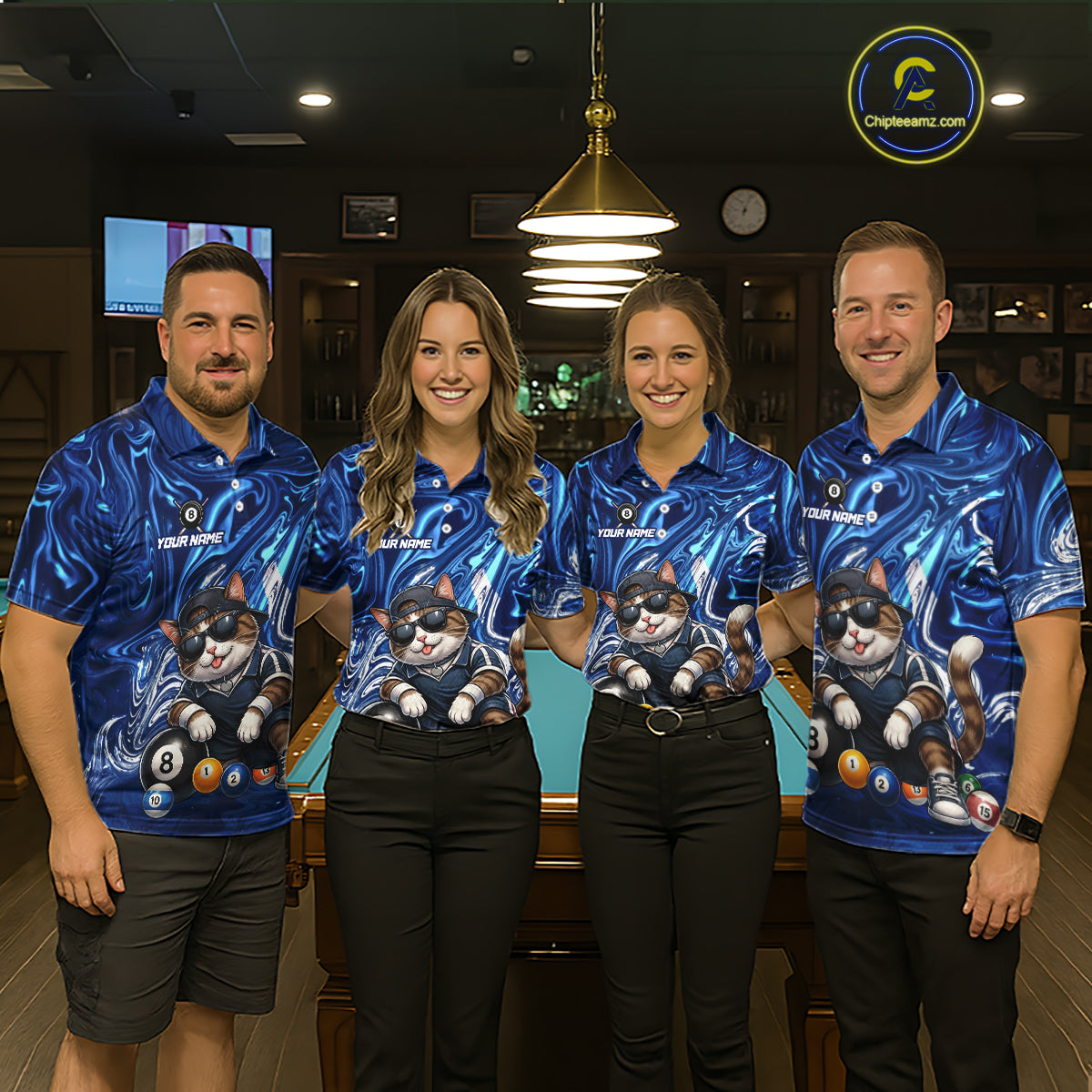 Four people wearing matching blue shirts with a cat design in a bar setting.