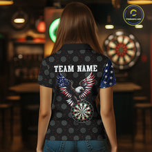 Load image into Gallery viewer, Back view of a female model showing off a patriotic darts shirt, featuring a striking bald eagle and dartboard graphic along with a customizable team name.