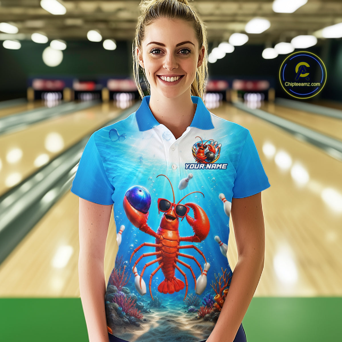 Person wearing a blue shirt with a lobster design in a bowling alley