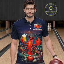 Load image into Gallery viewer, Man wearing a navy blue polo shirt with a colorful lobster design in a bowling alley.