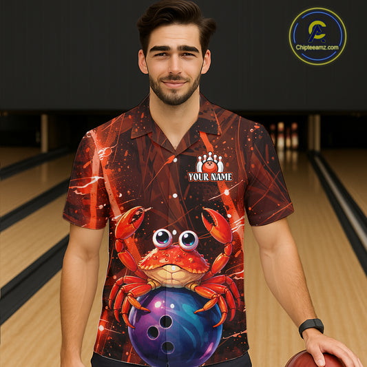 Man wearing a colorful shirt with a crab and bowling ball design on a bowling alley.