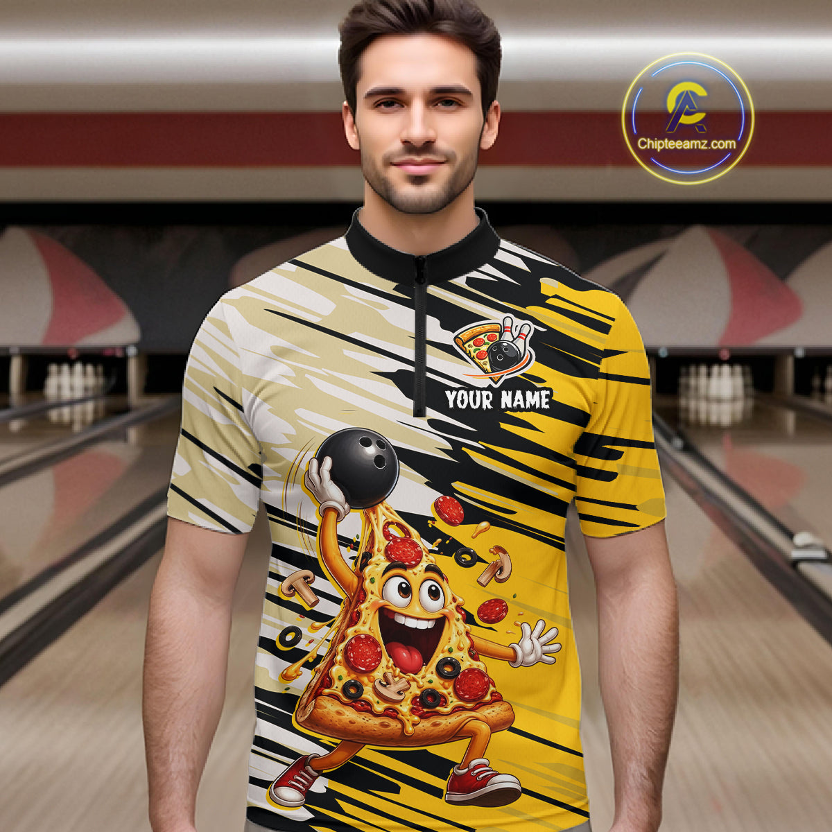 Man wearing a colorful bowling shirt with a cartoon pizza design in a bowling alley.